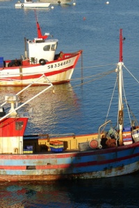 Photo: fklv, two fishing boats, Flickr, Creative Commons License 2.0 generic.