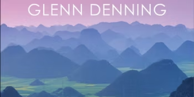 Cover of Universal Food Security by Glenn Denning depicting a mountain range.
