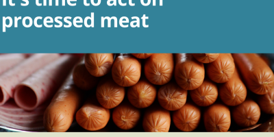 Cover of It’s time to act on processed meat, a report by Eating Better, showing a pile of frankfurters 