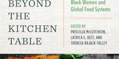 The cover of Beyond the Kitchen Table shows a world map made out of spices.