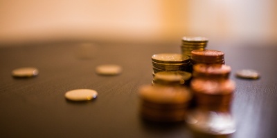  Stack of coins. Image by Lalmch from Pixabay