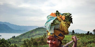 Photo of woman in African highlands. 