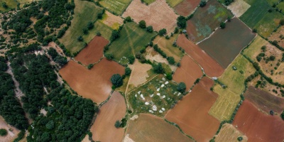 Aerial picture of farms. Credit. mikhail-nilov via Pexels. 