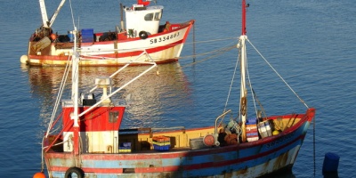 Photo: fklv, two fishing boats, Flickr, Creative Commons License 2.0 generic.