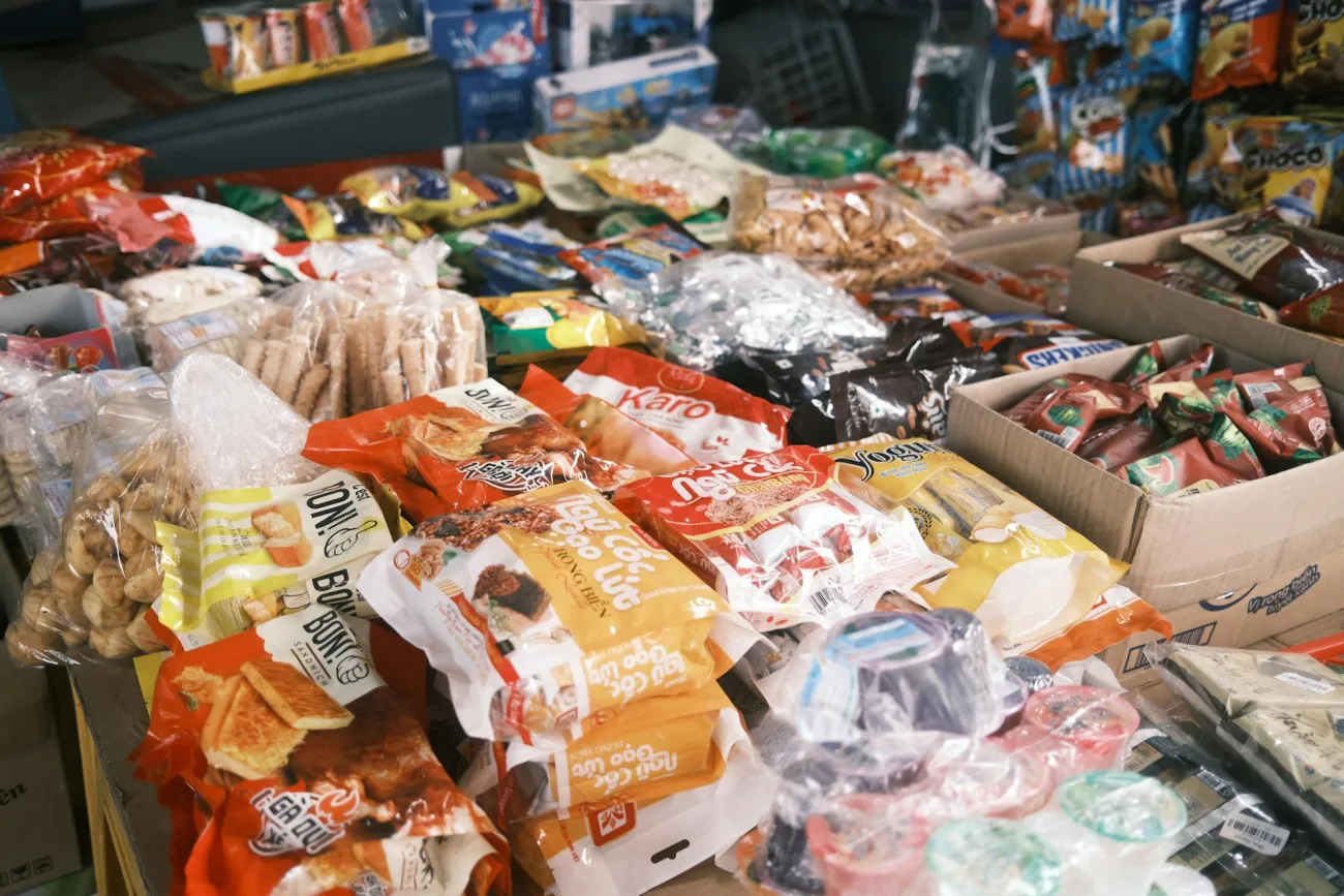 Wrapped sweets and chocolates on stand. Credit: angie duong via Pexels